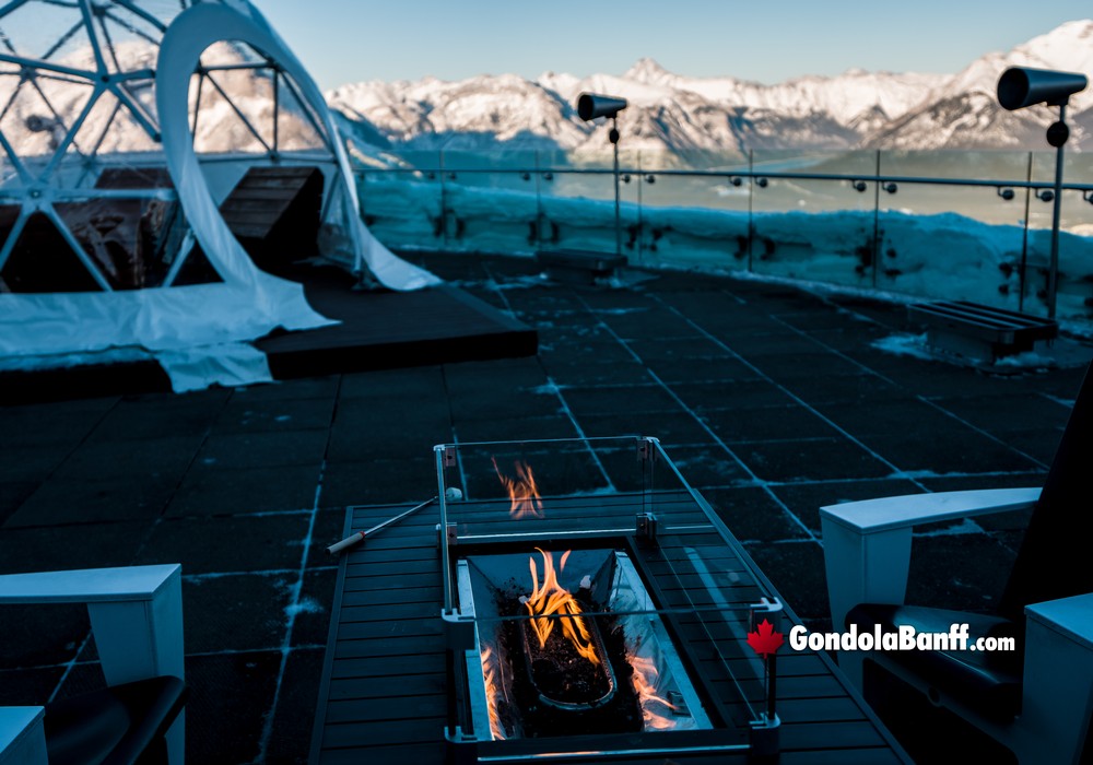 Winter Nightrise Fire and Igloo Warmth on the Banff Gondola Patio