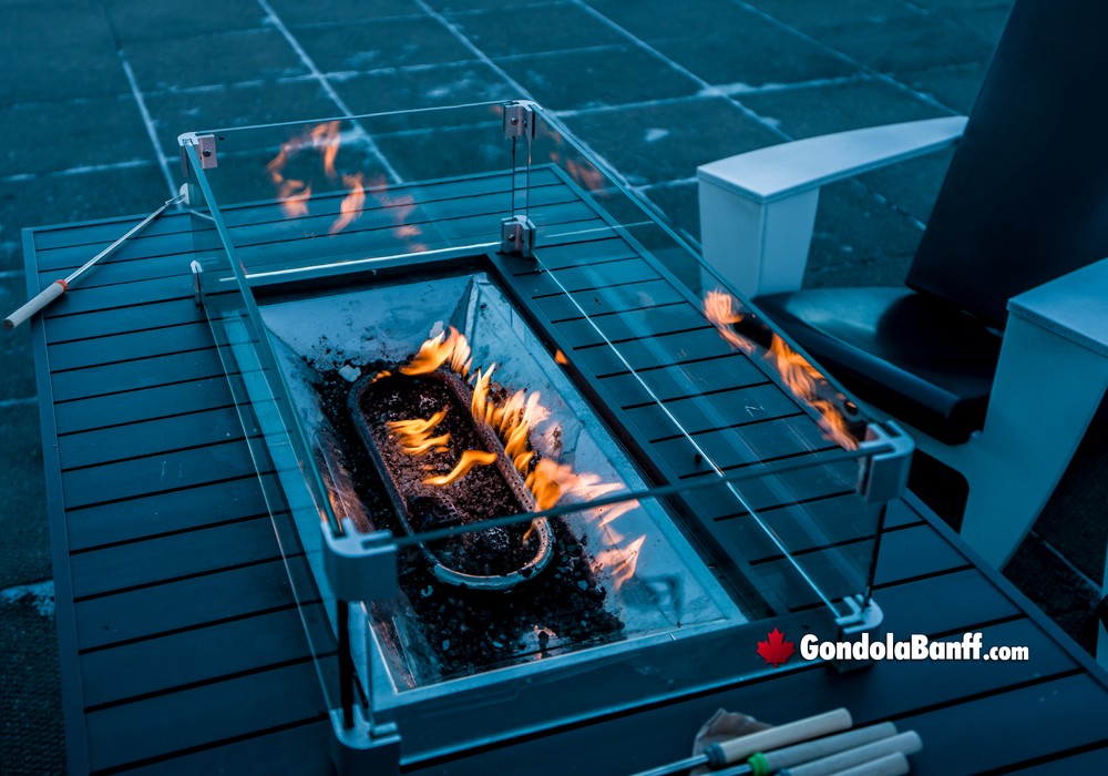 Winter Nightrise Warmth Roasting Marshmallows by Patio Fire