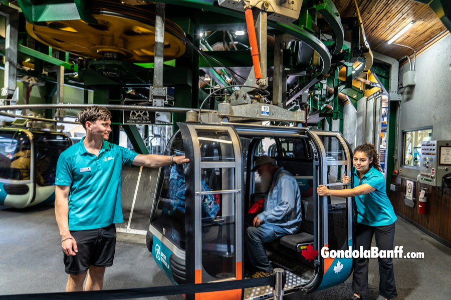 Getting on to a Banff Gondola Car